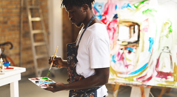 Young man painting